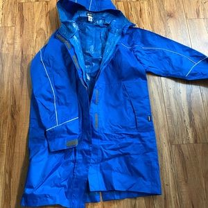 Long raincoat in blue. Mountain equipment company.(MEC) size medium